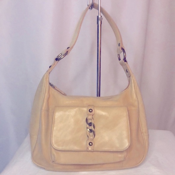 WILSONS LEATHER tan shoulder hand bag. Bronze hardware. Zipper closure on top. - Picture 1 of 15